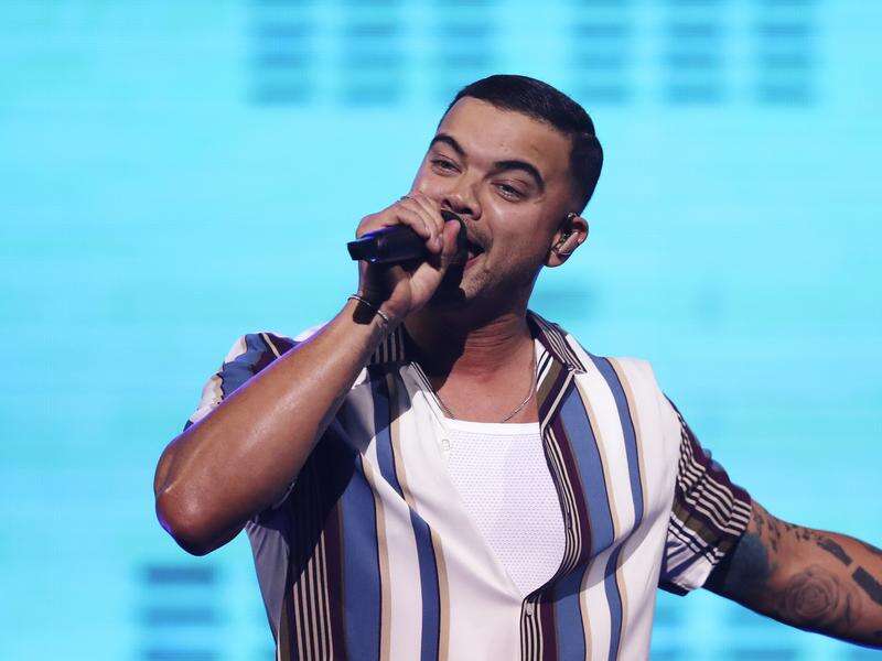 Guy Sebastian's manager apologises, settles legal fight