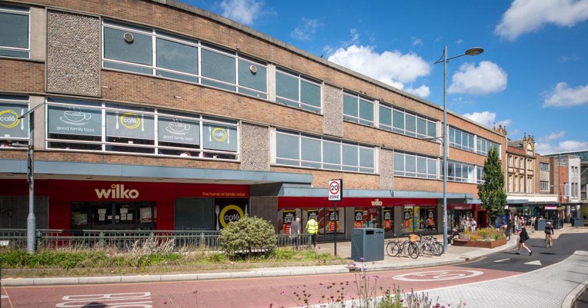 Plans to turn empty department store into 70 flats met with objections
