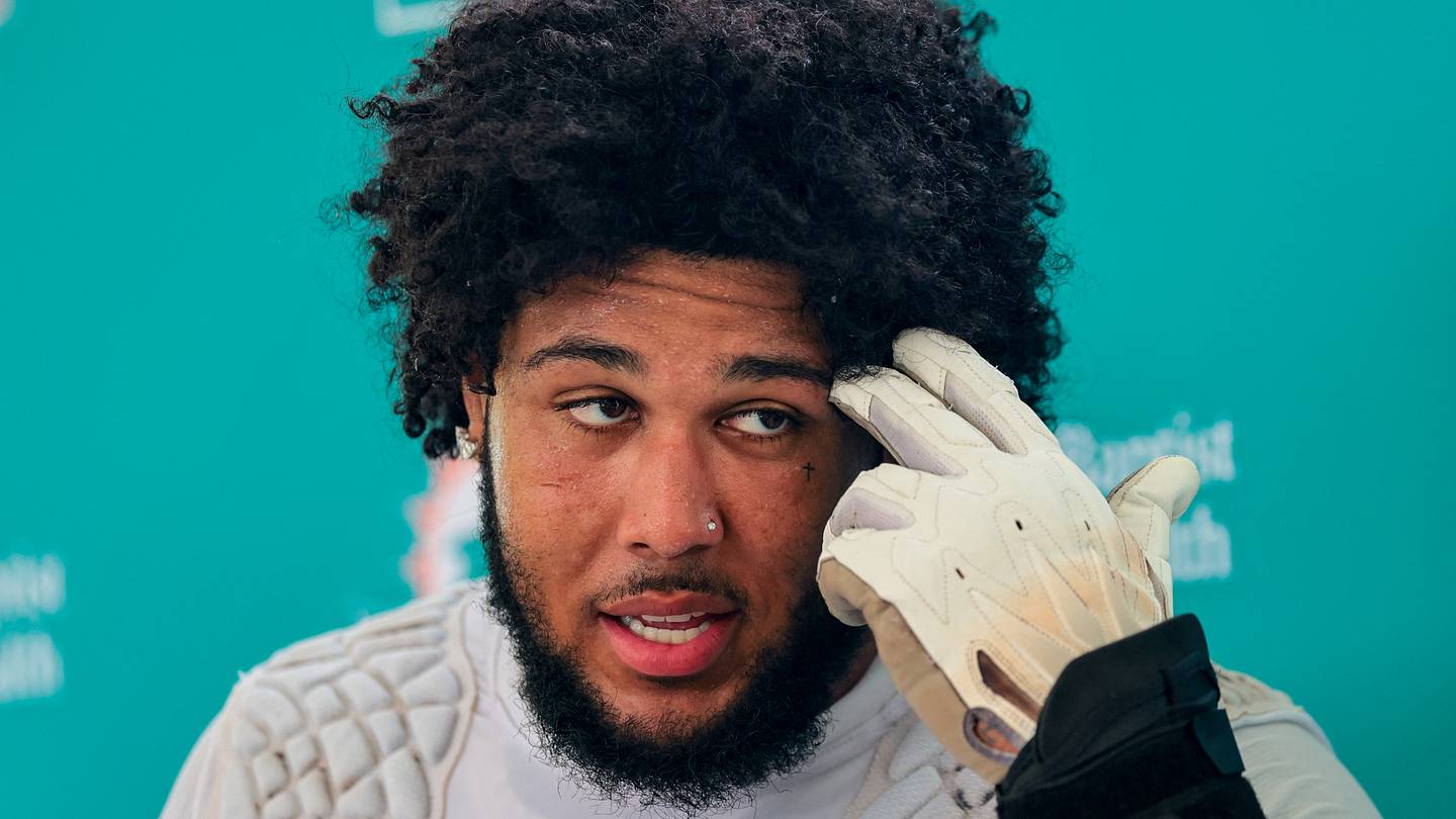 Kadyn Proctor is taking full advantage of the Dolphins' veterans around him