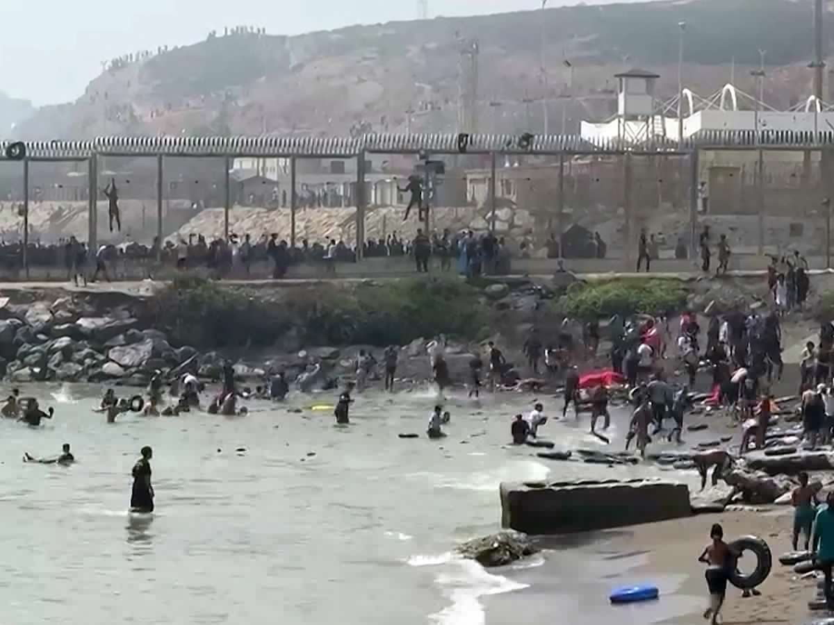 Spain to send troops after hundreds of migrants flood into Ceuta exclave from Morocco