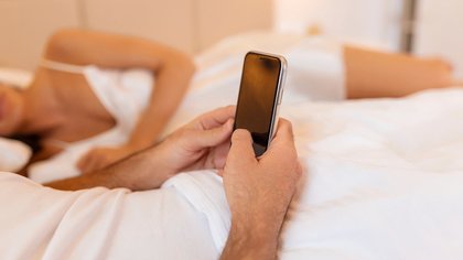 Seven new ways men are starting affairs and why a sudden Vinted and LinkedIn obsession should set alarm bells ringing: These are all the secret signs to spot on his phone
