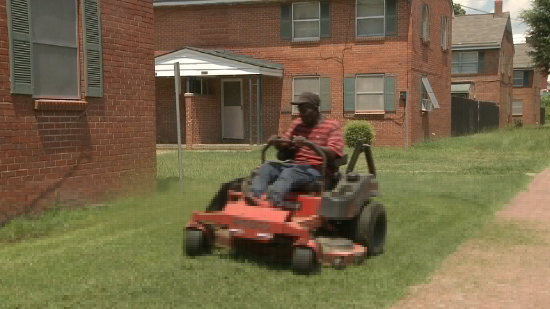 Selma landscapers beat the heat with water and frequent breaks