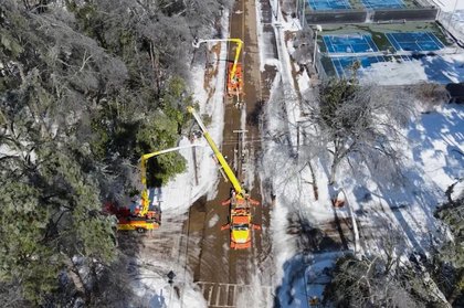 Crews race to restore power, open roads as the US South braces for another blast of dangerous cold