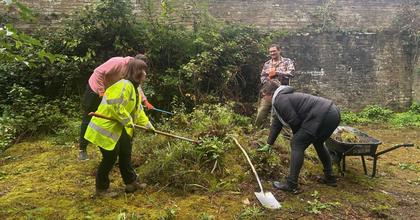 Team of volunteers transform area of Bradford park into new community space