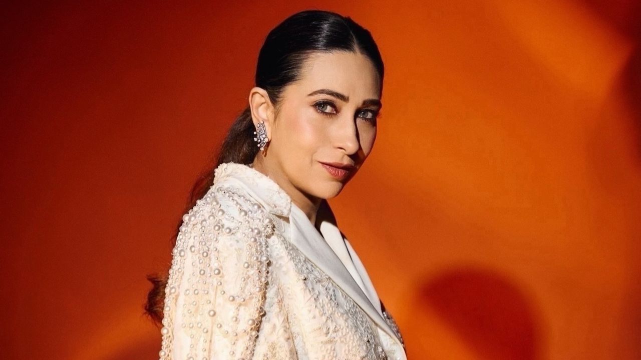 Karisma Kapoor wore a Manish Malhotra blazer look embroidered with pearls and lace
