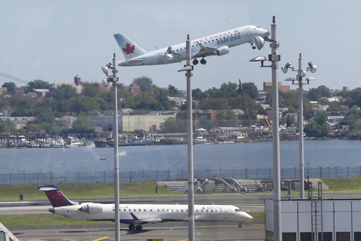 Two planes collide at LaGuardia, injuring one flight attendant