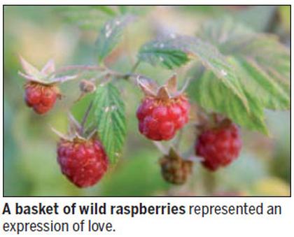 A basket of wild raspberries, with love