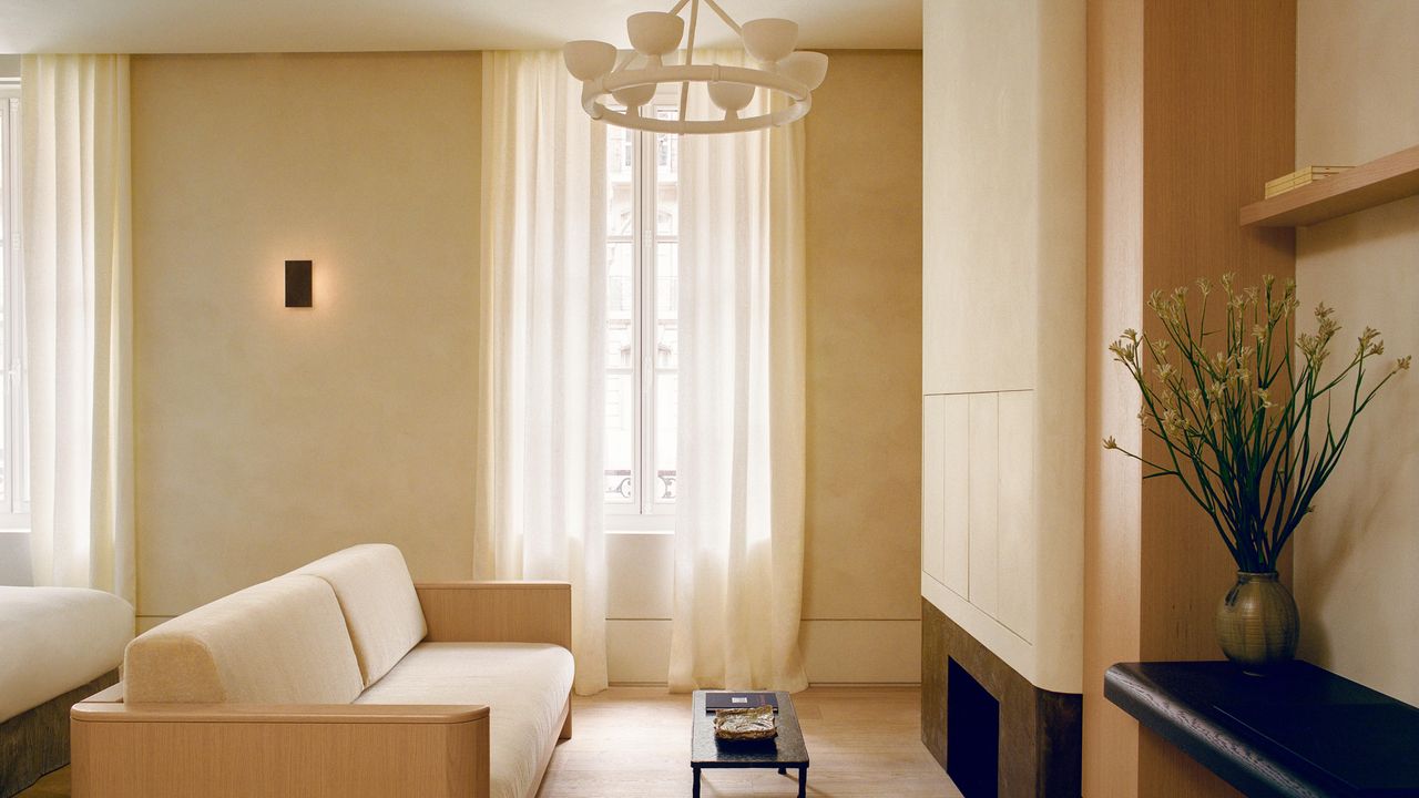 A Canopied Bedroom and Light Oak Defines This Retreat on Paris’s Left Bank
