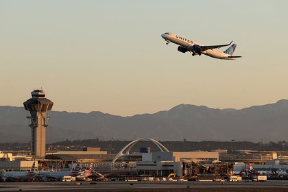 Americans Are Cutting Spending to Keep Traveling, Survey Finds