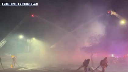 Crews battle fire at Phoenix commercial building