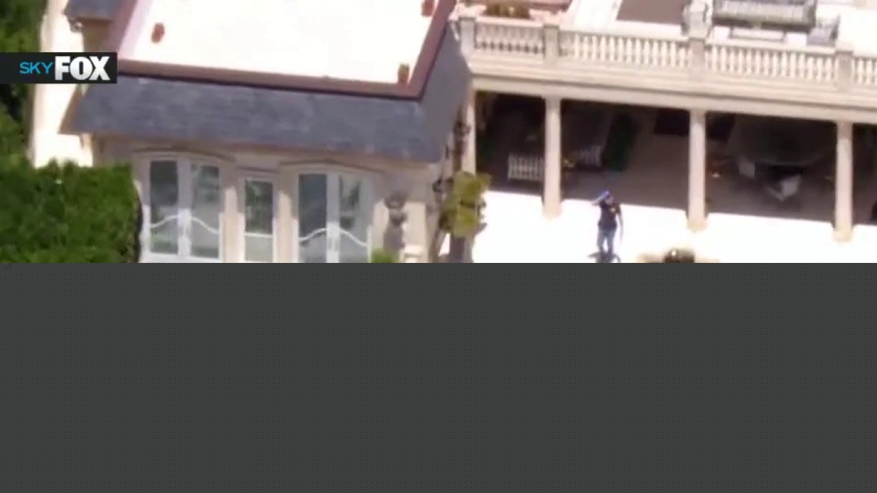 FBI serves search warrant at Beverly Hills mansion