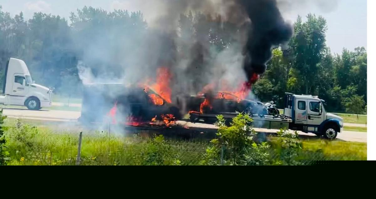 Multiple Vehicles Attached to Flatbed Catch Fire on Hwy. 52