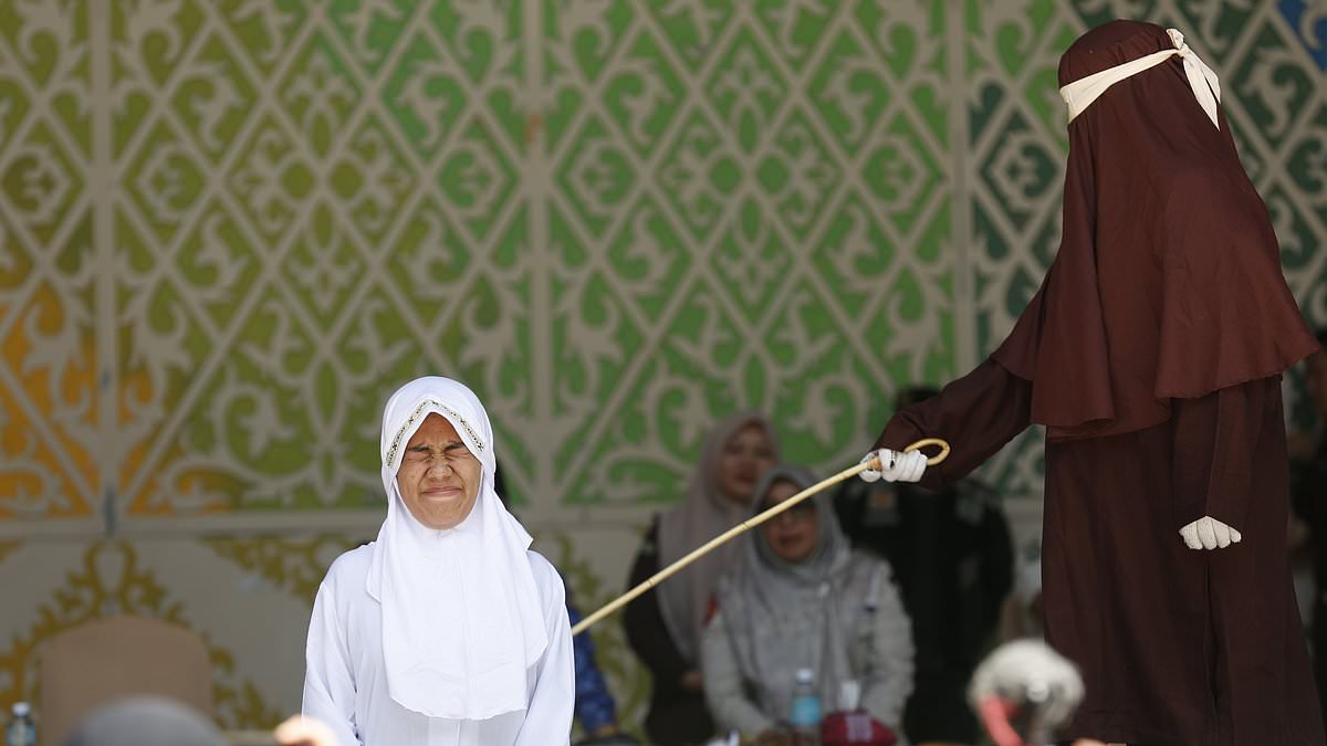 'One of the most severe' Sharia law canings carried out in Islamic Indonesian region sees woman collapse after she is lashed 140 times for having sex outside marriage