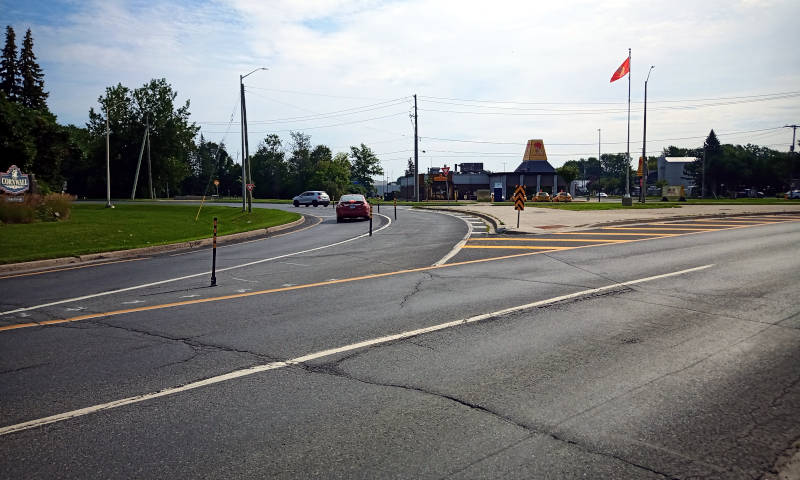 What drove change to Rotary Traffic Circle?