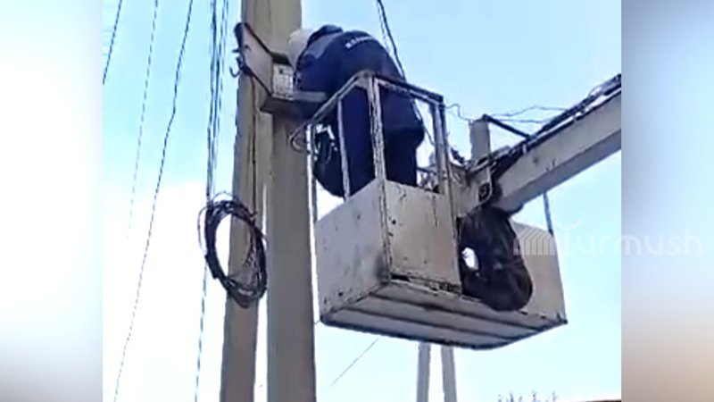 Time relays for street lighting being installed in Kara-Balta