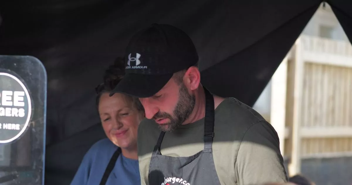 Man spends £10,000 buying burgers from Tesco and Sainsbury's and then handing them out to strangers