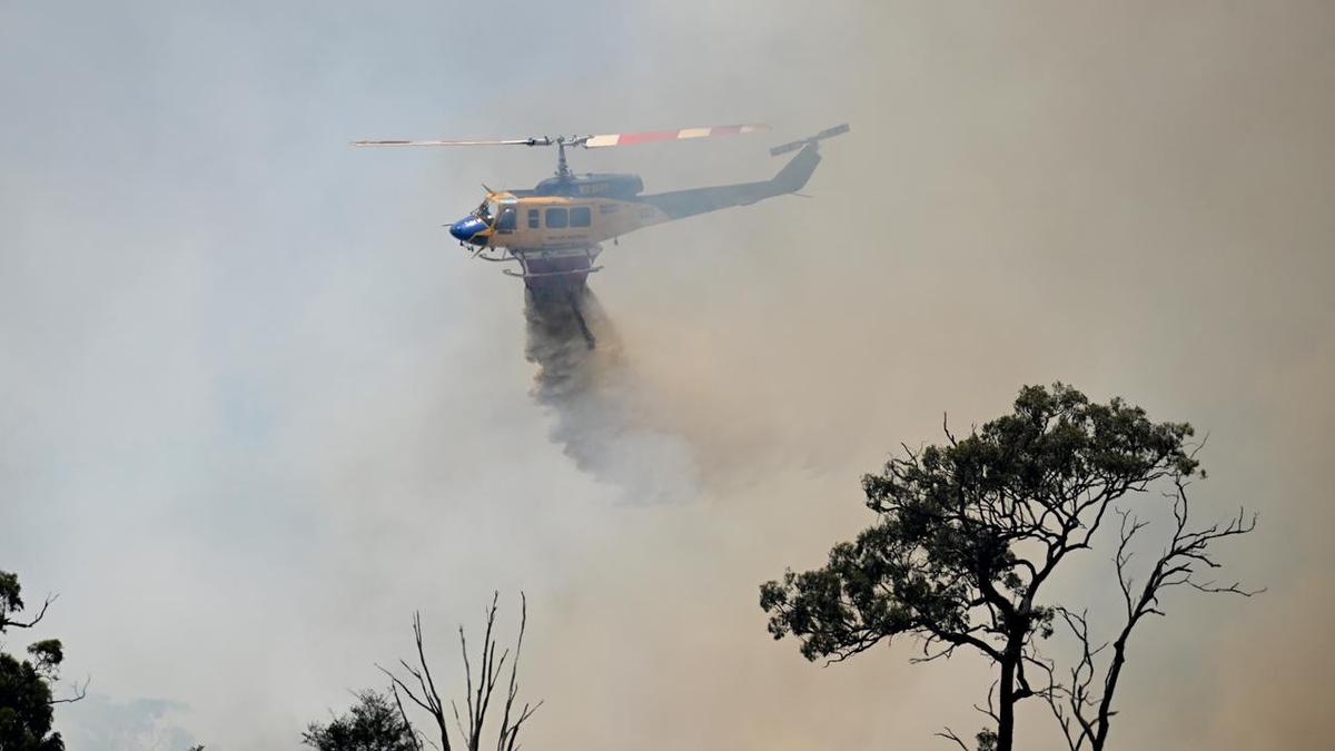 Two dead, Australian owned choppers crash in fire fight