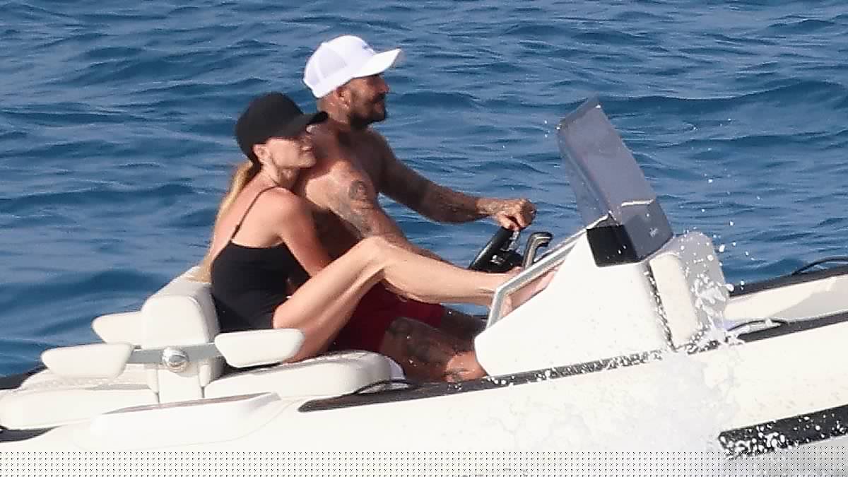 Victoria Beckham wraps her legs around husband David on speedboat while wearing skimpy swimsuit as he gives James Bond a run for his money in Formentera