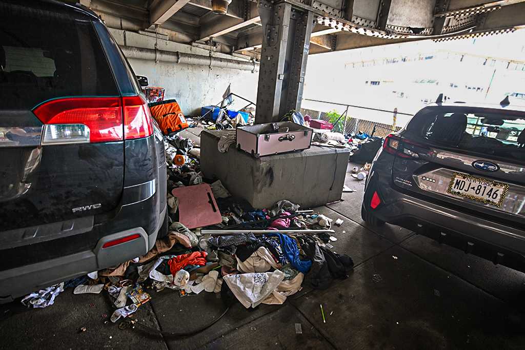 Mounds of trash and foul smells pervade Lower Manhattan as homeless takeover FDR Drive