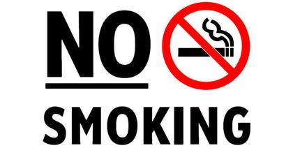 English Councils banned staff from smoking at their desks at HOME