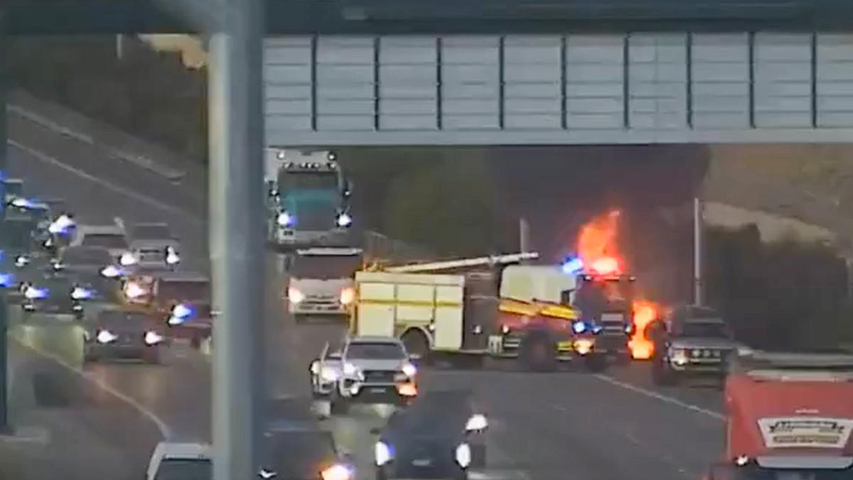 Car engulfed in flames on Kwinana Freeway backs traffic up heading north into city