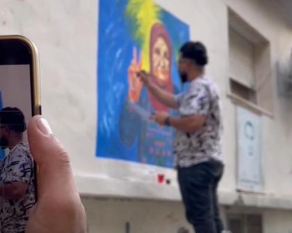 From Camp Walls to the Separation Barrier, Artist Paints the Story of a People