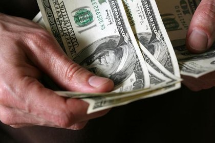 Dollar whipped as markets wary of mounting risks