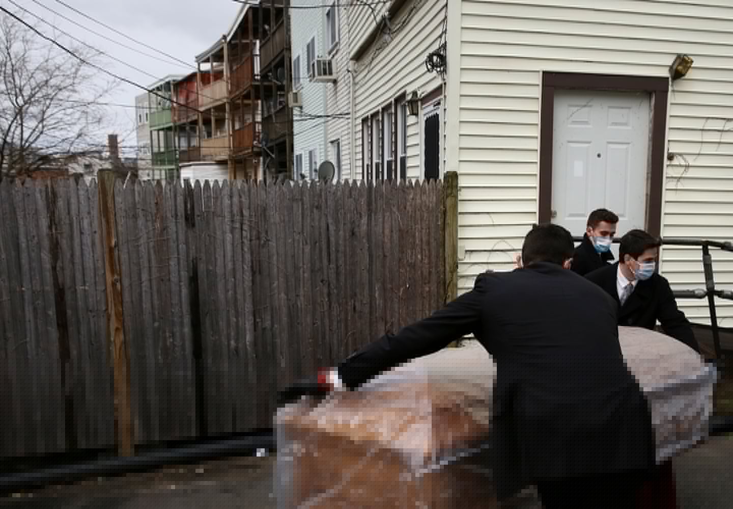 A funeral home copes with the surge during the coronavirus pandemic
