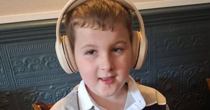 Heartbreaking tribute to boy found dead at home as woman charged with murder