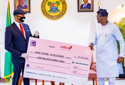 PHOTO NEWS: UBA Presents N1 Billion Cheque to Lagos to Combat COVID-19