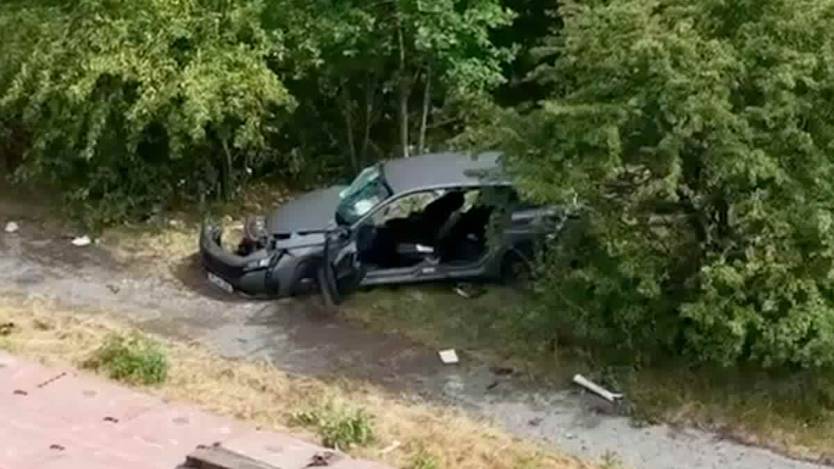 Two police officers are rushed to hospital after their unmarked car collided with an HGV
