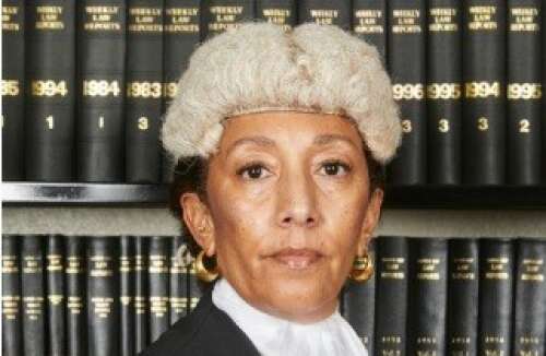 Justice argues court’s criticism caused reputational harm