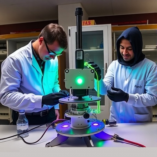 Researchers Align Green-Light Optical Components on Laboratory Optics Table