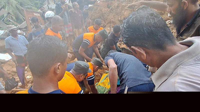 Four missing after landslide buries house in Polpitiya
