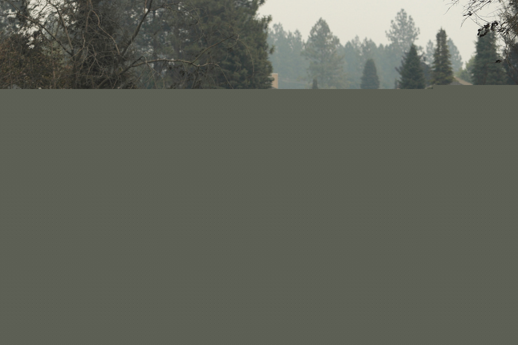 Washington state fires destroy hundreds of structures and force Spokane-area residents to evacuate