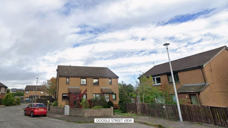 Woman dies and man arrested following disturbance at property