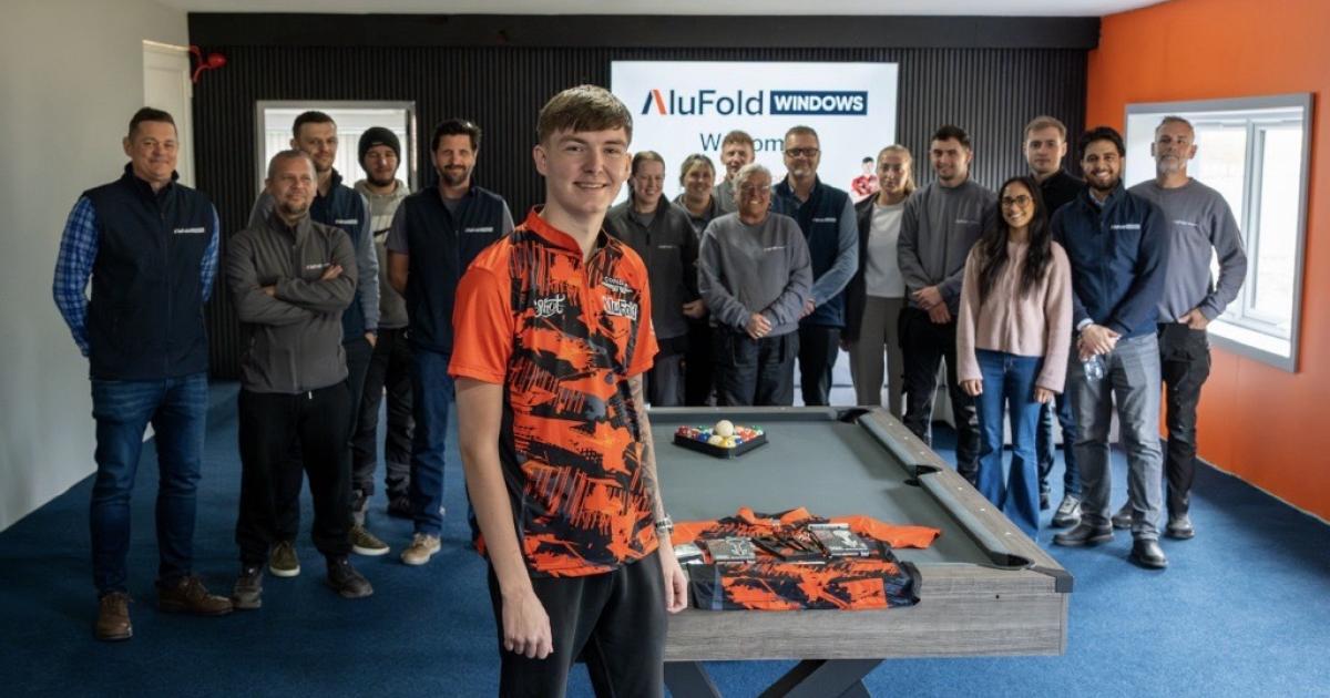 Blackburn darts star takes on staff in new games room at AluFold Windows