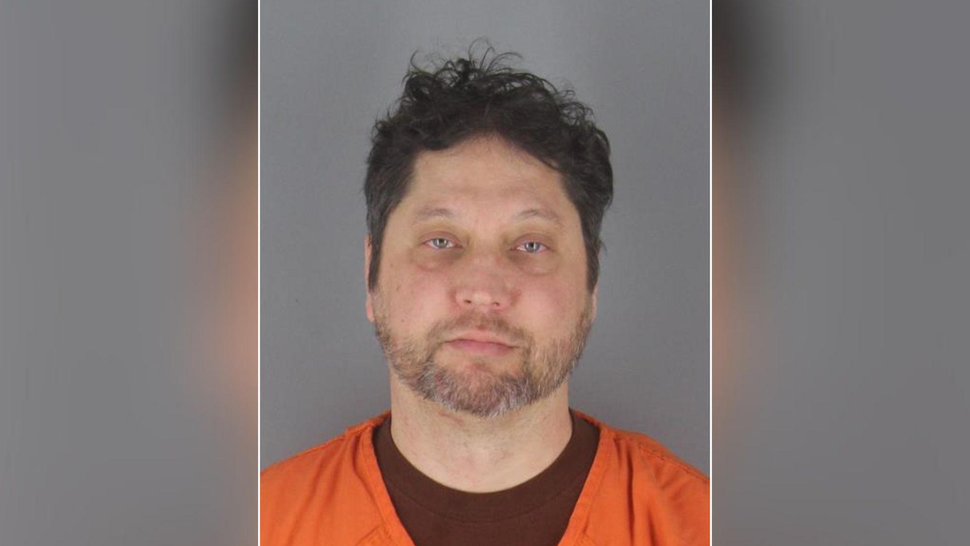 Man who sprayed Rep. Ilhan Omar during town hall charged with assault