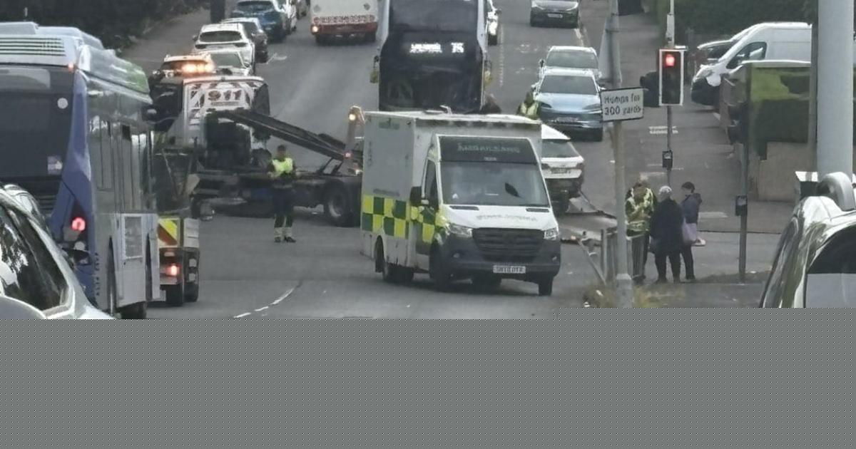 Crash closes Glasgow road in both directions as emergency services divert traffic