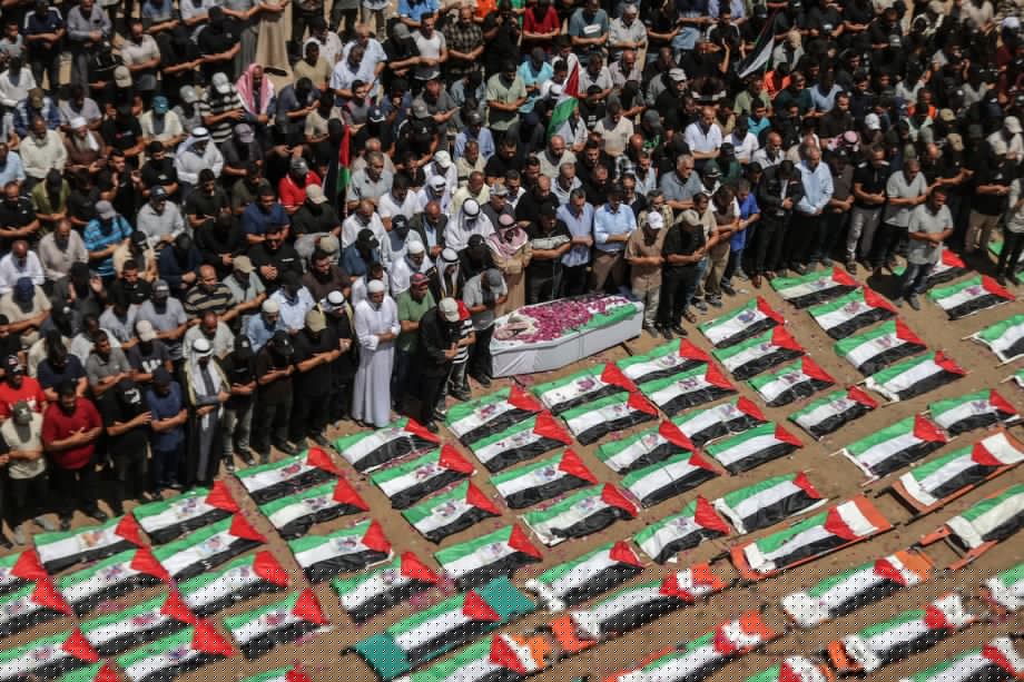 Palestinians mourn 112 people retrieved from rubble in Gaza