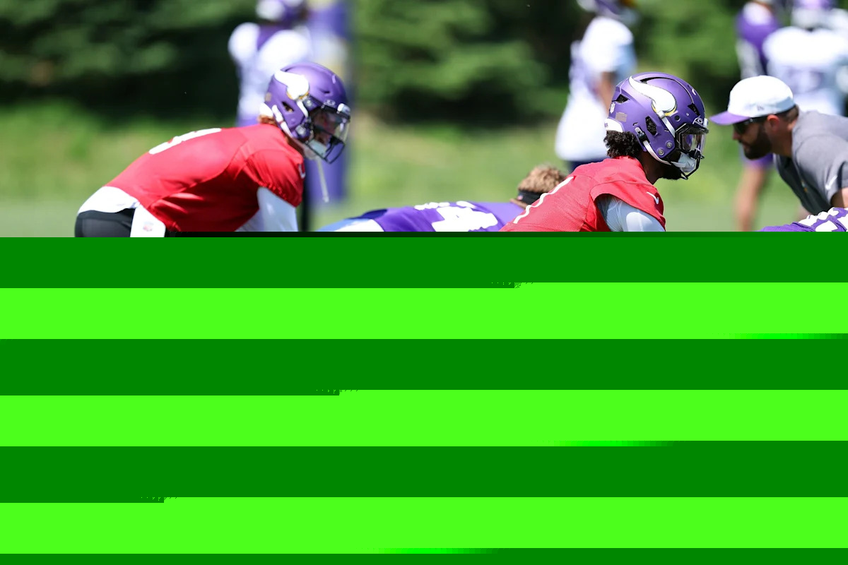 Which position battle does ESPN have its eyes on with the Vikings?