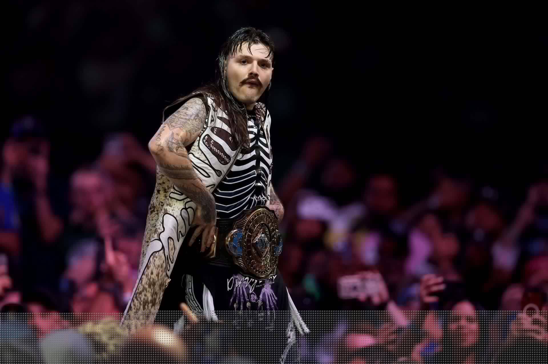 Dominik Mysterio explains why he wears a vest in WWE
