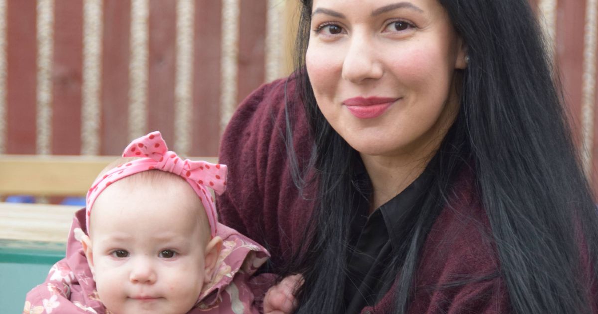 Mum took part in her own C-section, lifting baby out onto her chest