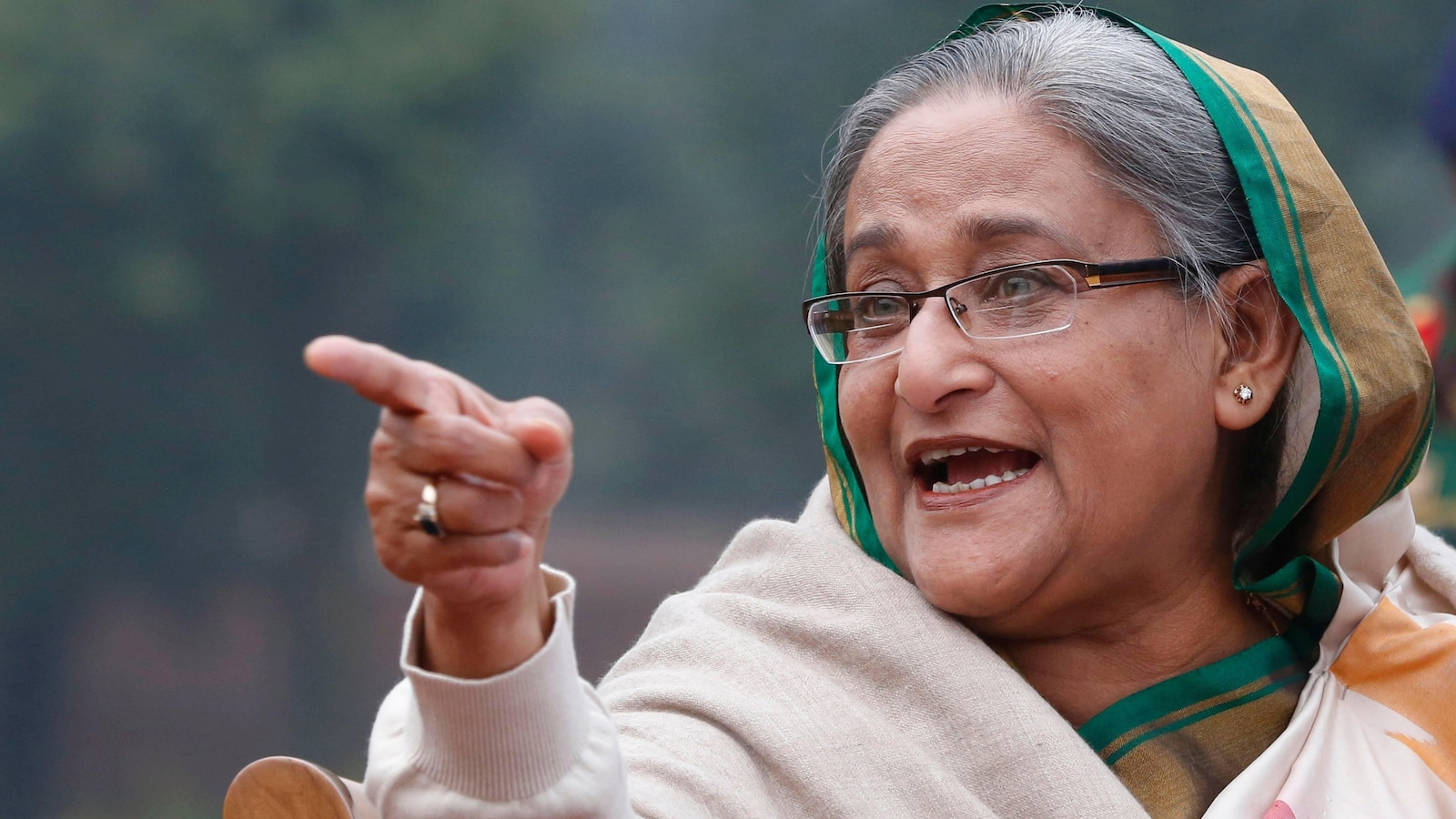 Bangladesh's ousted leader Hasina denounces the upcoming election from her exile in India