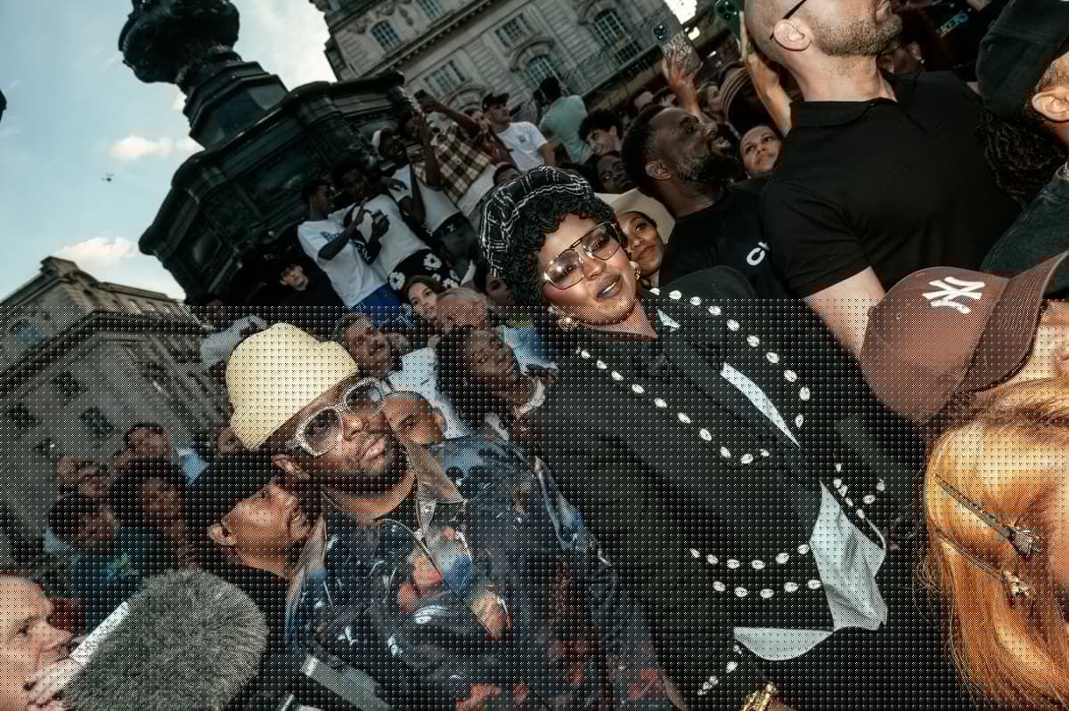 Lauryn Hill and Wyclef Jean surprise fans in Piccadilly Circus as they tease new Fugees album