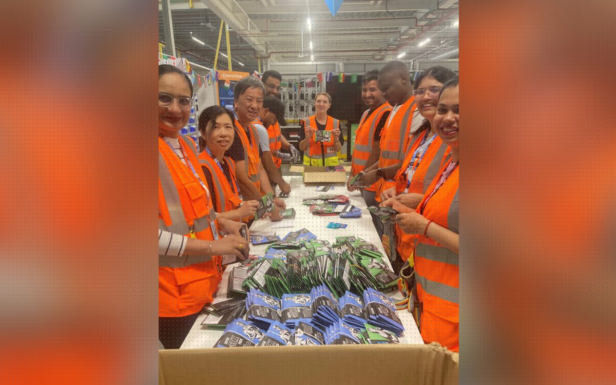 Redditch team celebrates Pride Month by packing 500 sexual health kits for LGBT Foundation