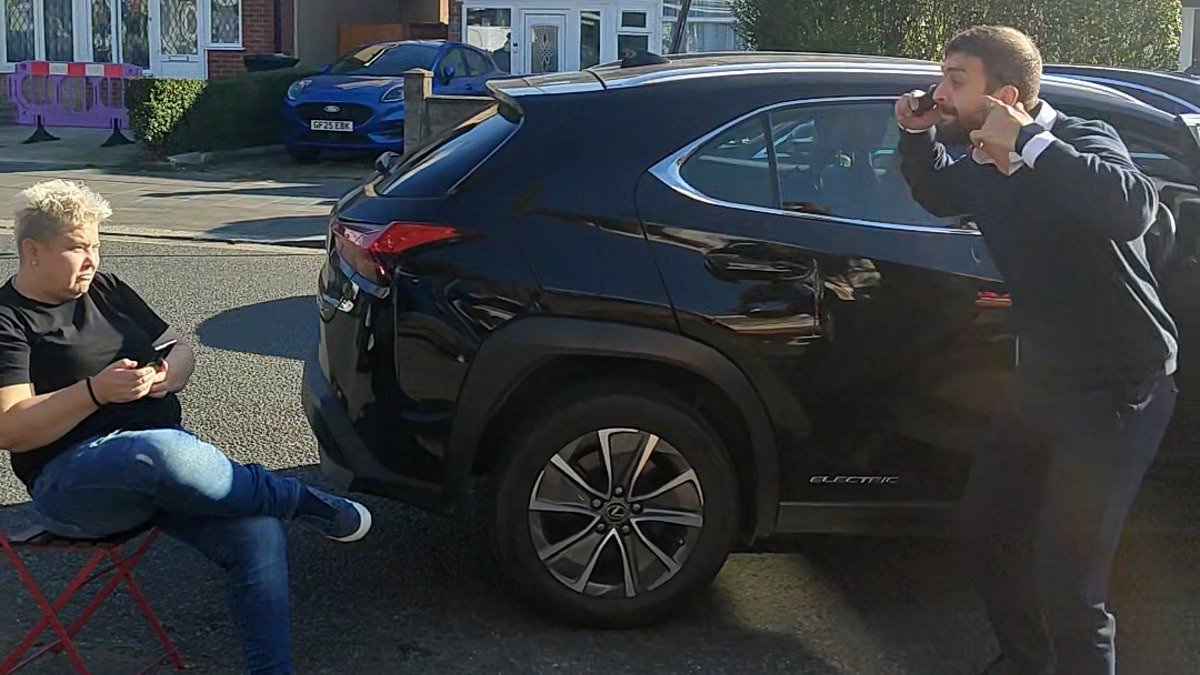 Furious roadside row erupts over woman blocking driver from parking his car so she can 'reserve spot for a friend'