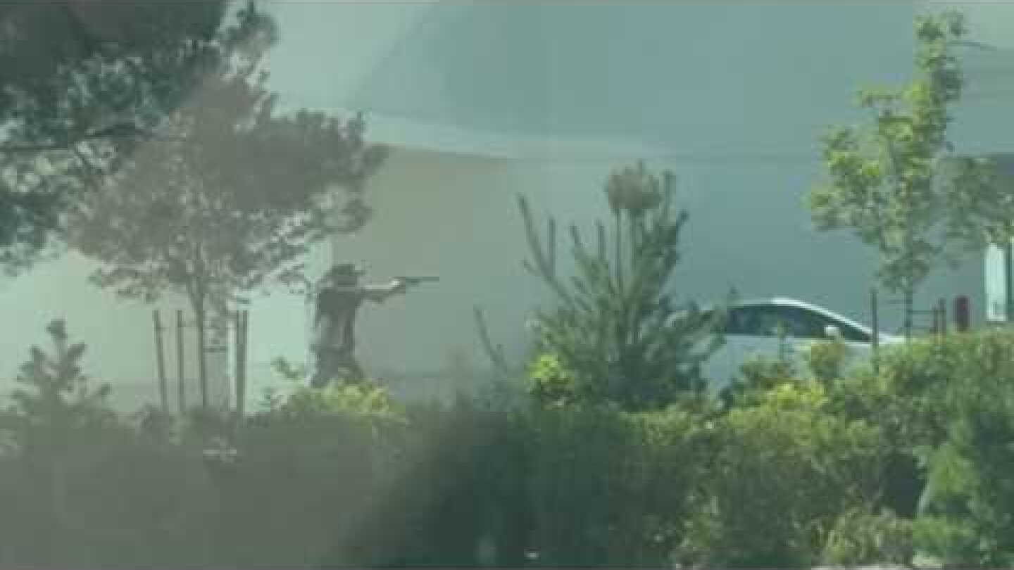 Idaho gunman who killed 3 was distracted by off-duty trooper, bystander who returned fire at him