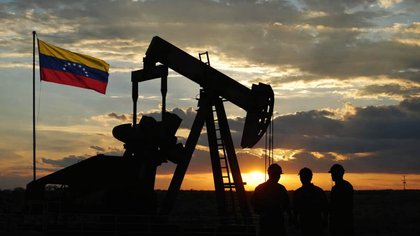 Venezuela’s acting president signs law privatising state-owned oil sector