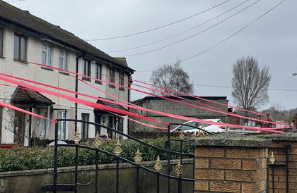 Community hangs red ribbons to pay tribute to Grace Lynch